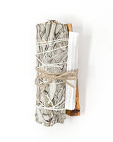 Bundle of white sticks tied with twine on a white background