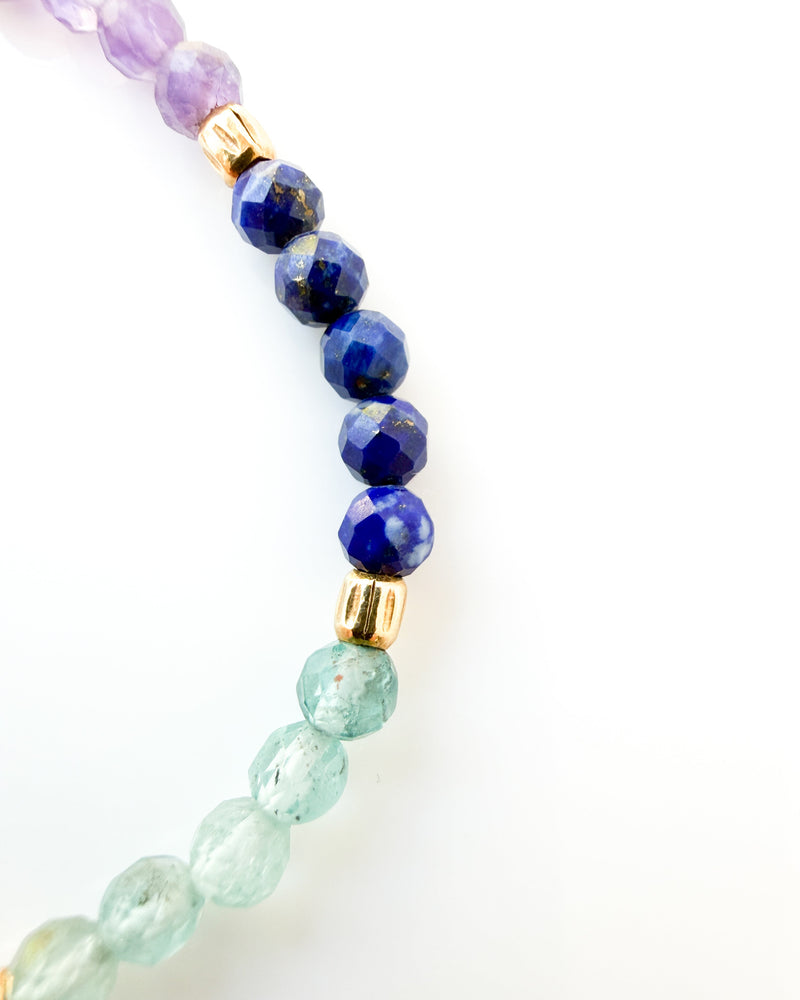 Amethyst · Lapis Lazuli · Blue Apatite · Rhodonite · Golden Rutile Quartz · Sunstone· Garnet · Moonstone Crystal Bracelet - Shimmering Chakras