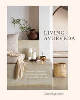 Book cover of 'Living Ayurveda' with a serene interior design scene.